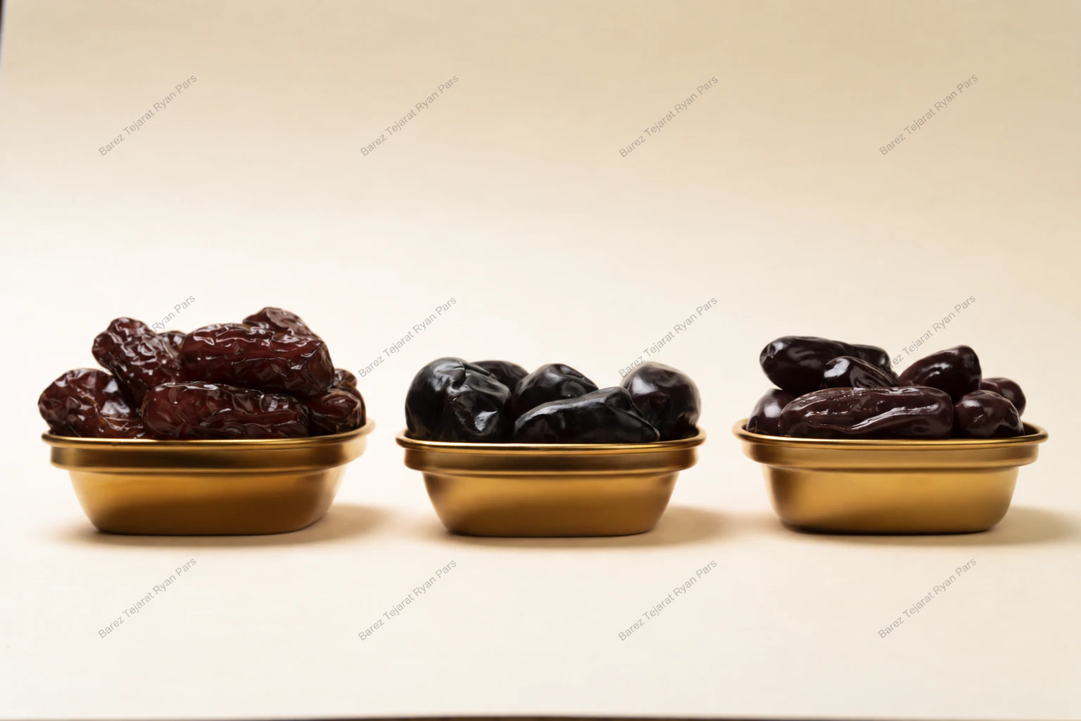 Different Iranian date varieties in three gold bowls
